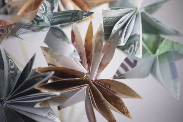 flowers origami banknotes - Foto, afbeelding
