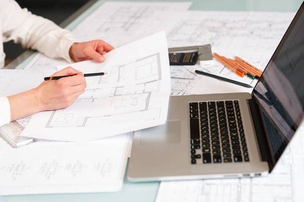 Designers work on a blueprint of new apartments - Photo, Image