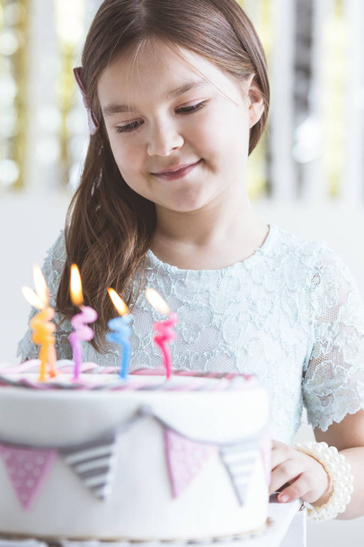 Cute girl with birthday cake - Фото, зображення