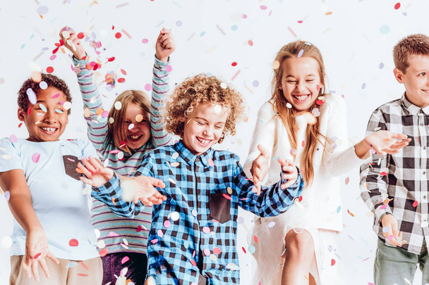 Kids with confetti - Фото, зображення