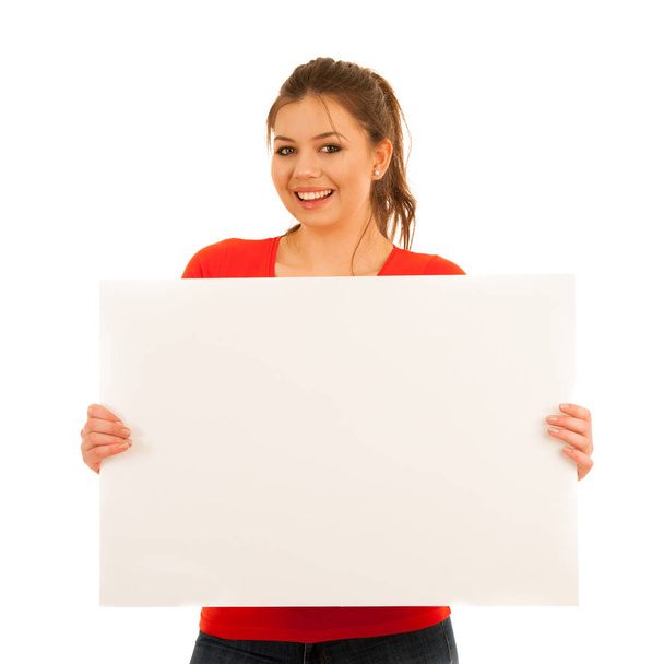 young woman holding white board isolated over white background - Foto, afbeelding