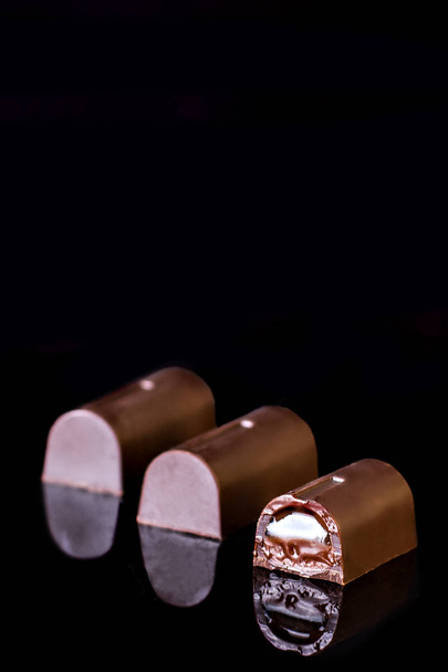 Chocolate candies  a black  - Valokuva, kuva