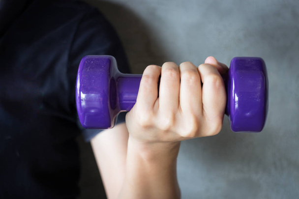 Woman Hand Holding Violet Dumbbell - Photo, Image