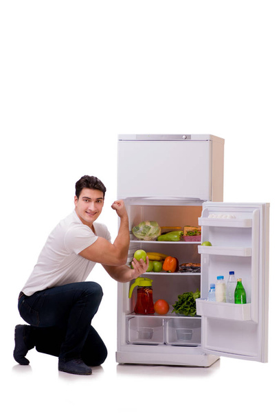 Muž vedle lednička plná potravin - Fotografie, Obrázek