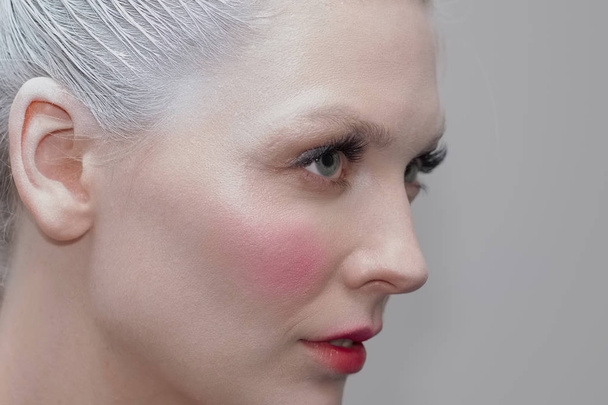Close-up portrait of girl with pink make up - Photo, image