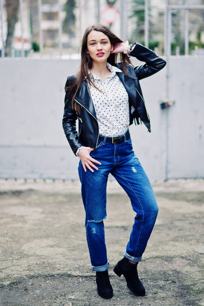 Full length portrait of stylish young girl wear on leather jacke - Foto, afbeelding