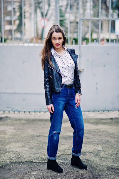 Full length portrait of stylish young girl wear on leather jacke - Фото, зображення