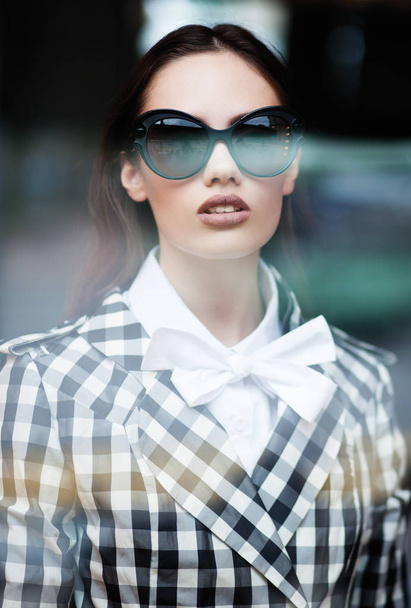 Young woman in sunglasses - Fotografie, Obrázek