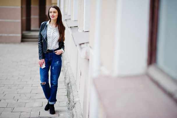 Portrait of stylish young girl wear on leather jacket and ripped - Photo, image
