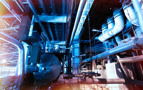 Промислова зона, сталеві трубопроводи і клапани в синіх тонах
 - Фото, зображення
