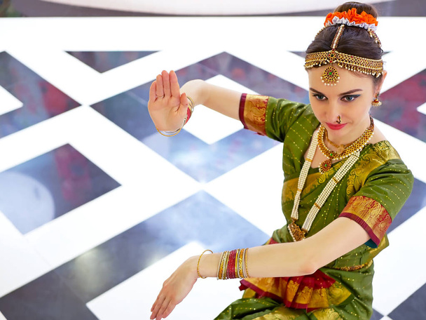 Beautiful indian girl dancer of Indian classical dance bharatanatyam . - Fotó, kép