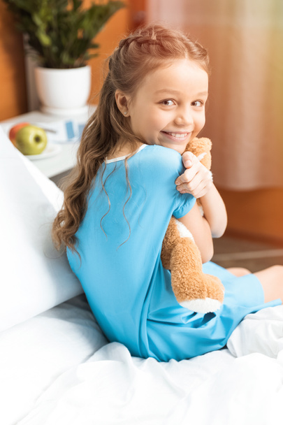 Little patient with teddy bear - Photo, Image