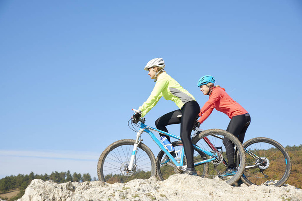 Two cyclist training outdoor  - Valokuva, kuva