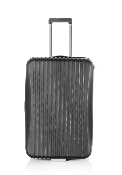 Μαύρη βαλίτσα σε λευκό - Φωτογραφία, εικόνα