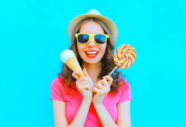 Fashion happy smiling young woman with ice cream and lollipop ov - Фото, изображение