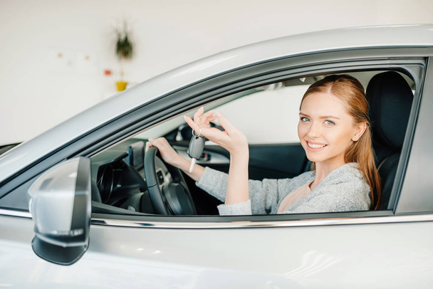Woman sitting in new car  - Photo, Image