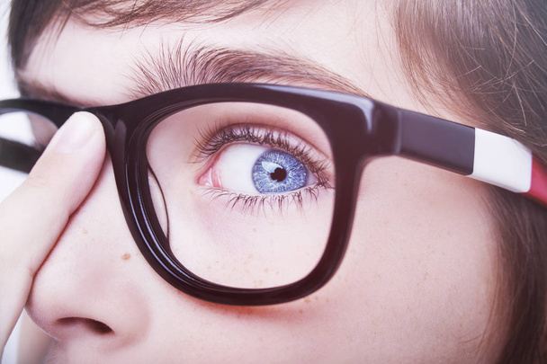 Portrait of a boy wearing glasses close, macro studio shot - Фото, изображение
