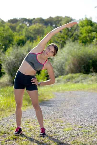 Fitness woman doing exercise - Fotó, kép