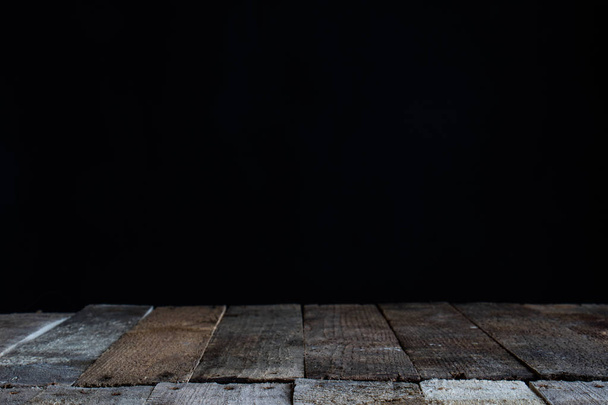 Black background with wood - Foto, afbeelding