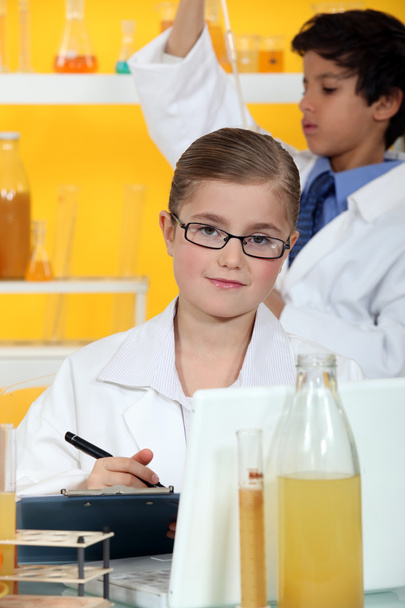 Two children conducting a science experiment - Photo, Image