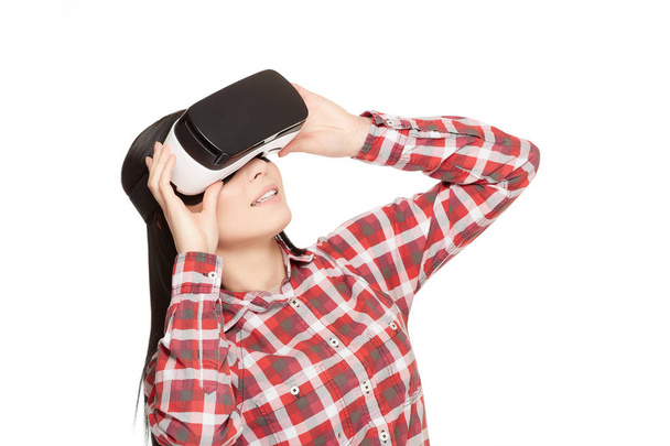 Girl in headset of VR watching video. - Foto, Imagem