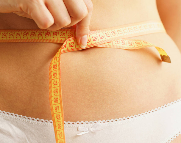 Healthy waist with measuring tape - Photo, Image