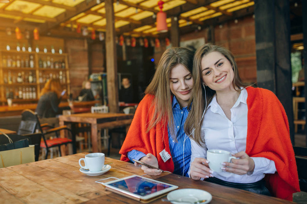 two girls in a cafe - Photo, Image