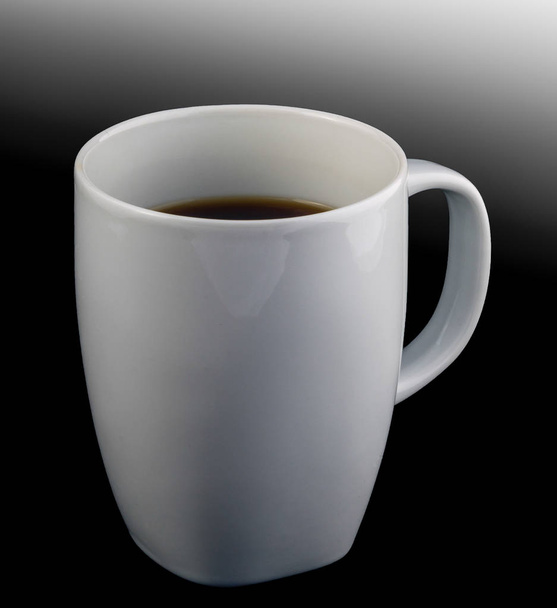 White cup of black coffee isolated on black graded background - Photo, Image