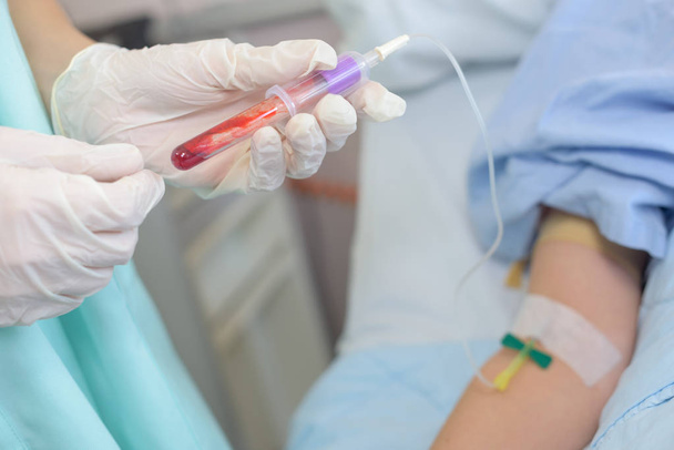 taking blood sample and work - Photo, Image