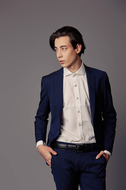 Business fashion man wearing blue suit with white shirt - 写真・画像