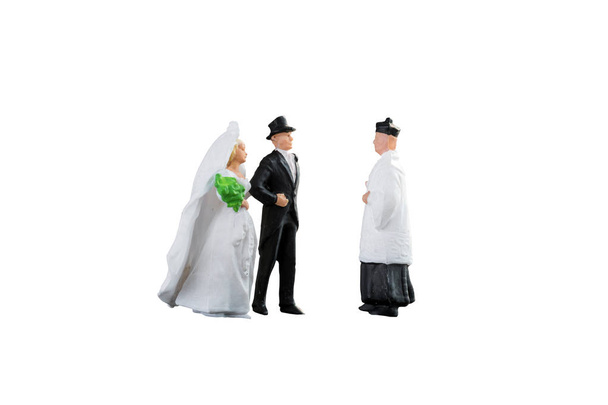 Close up of Miniature people wedding bride and groom couple - Фото, изображение