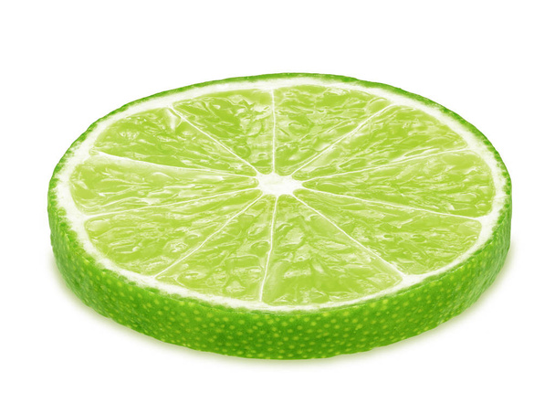 Slice of lime isolated on white background - Zdjęcie, obraz