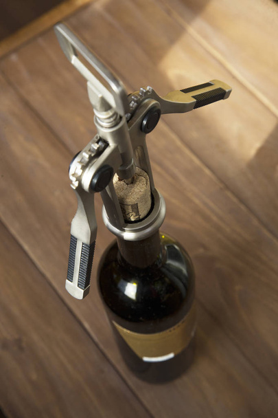 Bottle of wine On Wood Surface - Foto, Bild