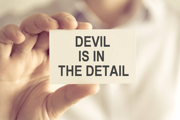 Εκμετάλλευση είναι διάβολος στο The λεπτομέρεια μήνυμα κάρτα επιχειρηματίας - Φωτογραφία, εικόνα