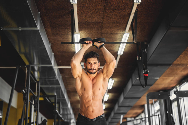 handsome man training at gym - Photo, Image