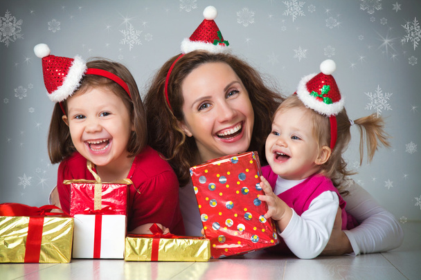 Happy family celebrating Christmas - Фото, зображення