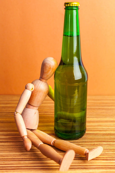 Wooden doll with Alcohol drink - Foto, immagini