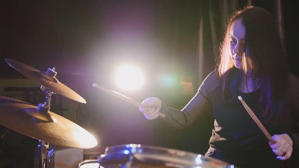 Young woman percussion drummer performing with drums - Foto, Imagem