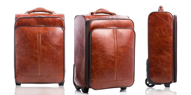 Set of leather business suitcases on white - Фото, изображение