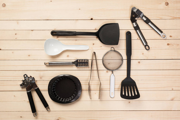 Cookware and accessories on table - Valokuva, kuva