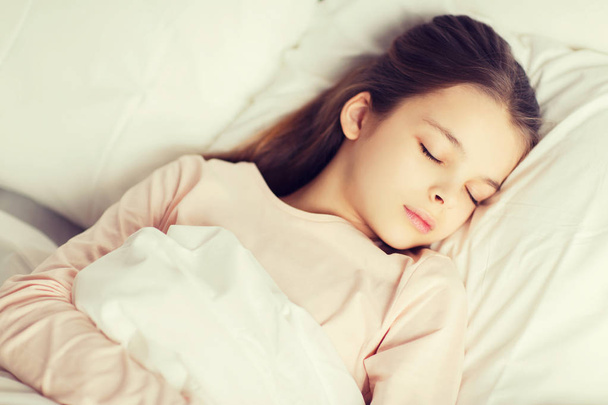girl sleeping in bed at home - Foto, Imagem