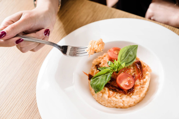Delicious risotto with tomatoes  - Fotó, kép