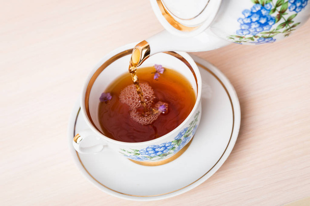 vintage cup of tea - Фото, изображение