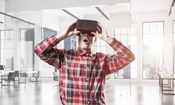 Young man with virtual reality headset  - Фото, зображення