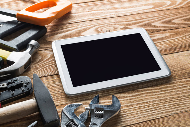 Variety of tools of builder and tablet pc - Valokuva, kuva