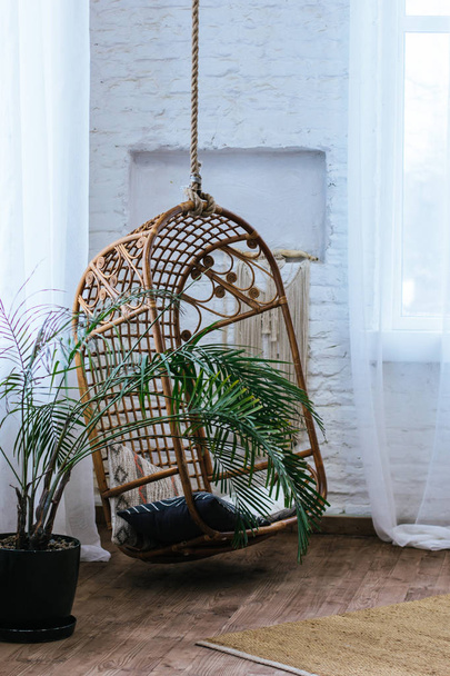 Interior with suspension cane-chair - Фото, зображення