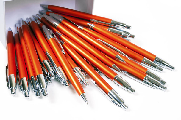  Oranje pennen achtergrond - Foto, afbeelding