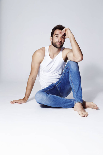 Bearded man in vest and jeans  - Foto, immagini
