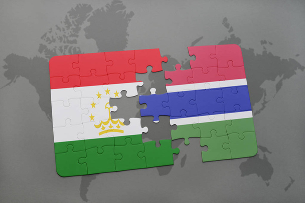 puzzle s státní vlajka Tádžikistánu a Gambie na mapě světa - Fotografie, Obrázek