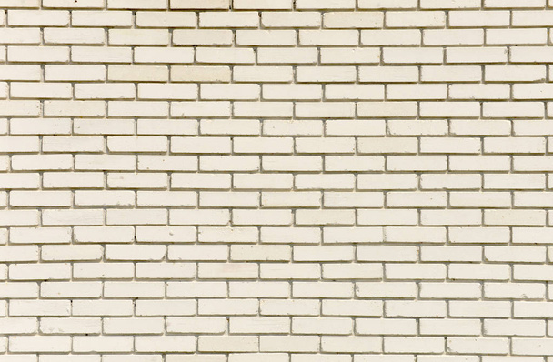 White brick wall background, beige, yellowish - Fotografie, Obrázek